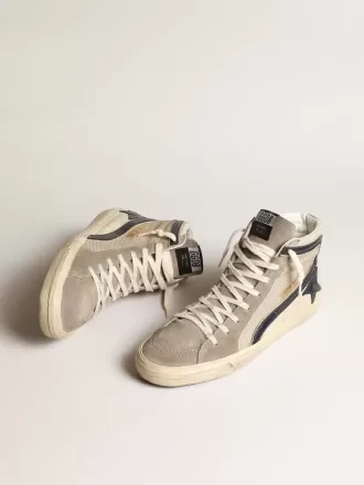 Slide i beige mesh och nylon med blå läderstjärna och blixt