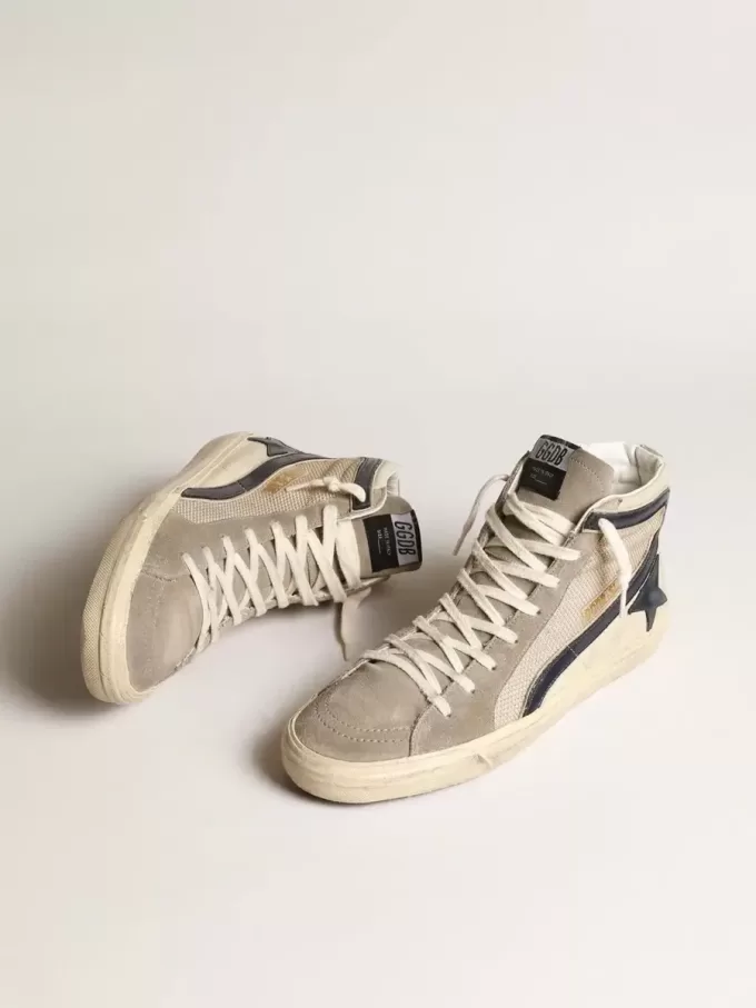 Slide i beige mesh och nylon med blå läderstjärna och blixt Slide i beige mesh och nylon med blå läderstjärna och blixt