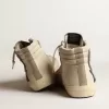 Slide i beige mesh och nylon med blå läderstjärna och blixt Slide i beige mesh och nylon med blå läderstjärna och blixt