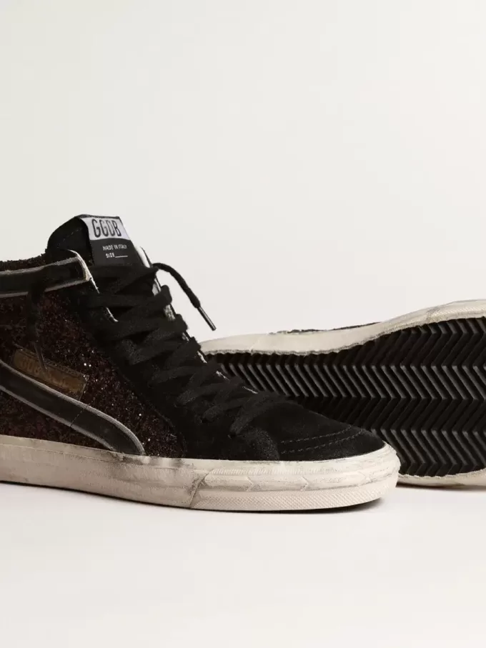 Slide i brunt glitter med svart läderstjärna och blixt
