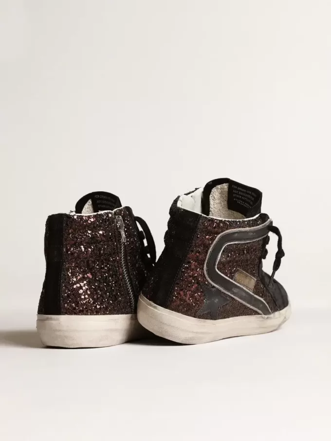 Slide i brunt glitter med svart läderstjärna och blixt