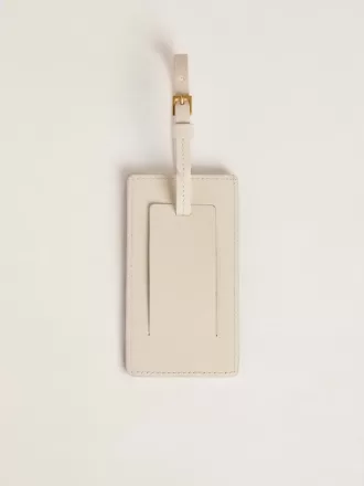 Sliten vit bagagetag