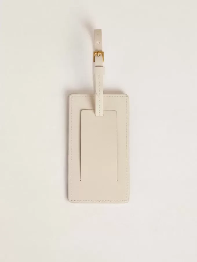 Sliten vit bagagetag Sliten vit bagagetag
