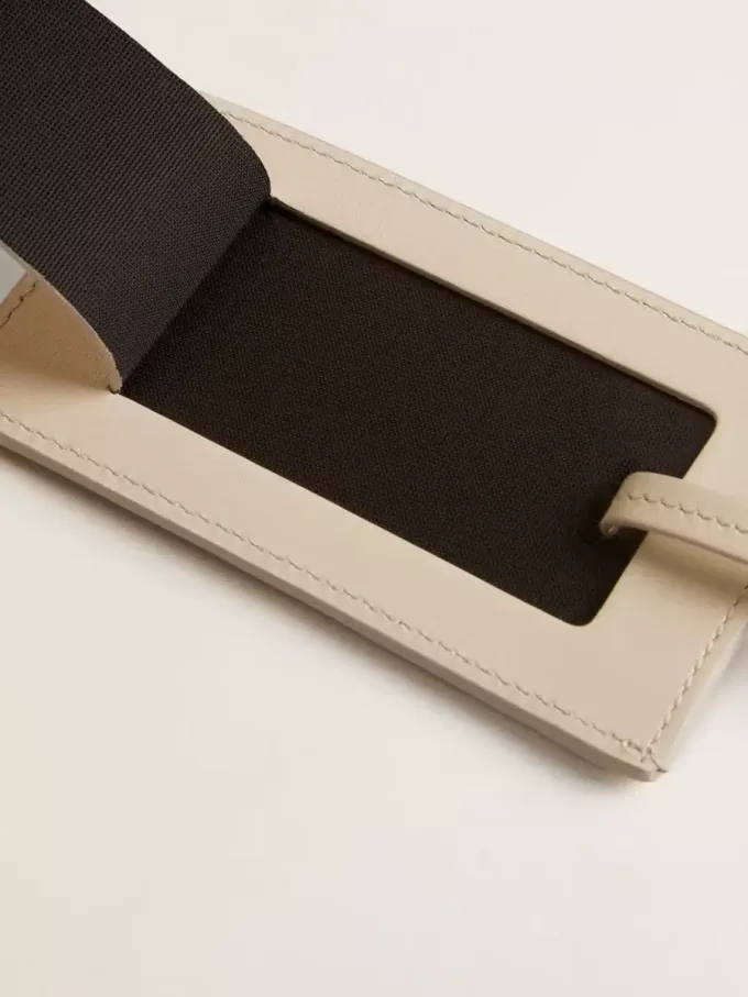 Sliten vit bagagetag Sliten vit bagagetag