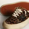 Space-Star Sabot för dam i leopardmönstrat ponnyhår med svart stjärna