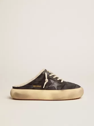 Space-Star Sabot-skor för herr i quiltad svart nylon med shearlingfoder