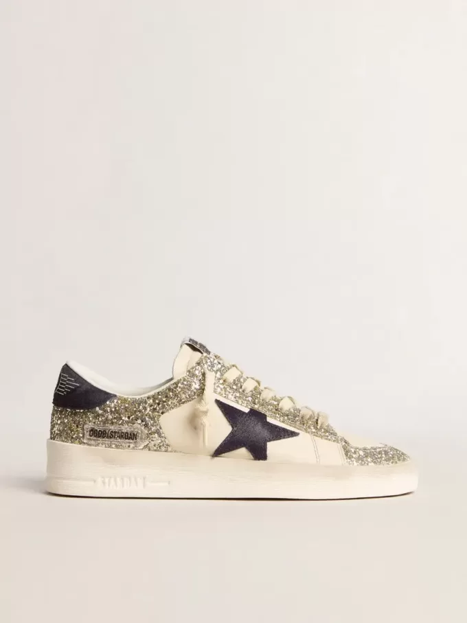 Stardan för damer i platinaglitzer med mörkblå mockastjärna och hälflik