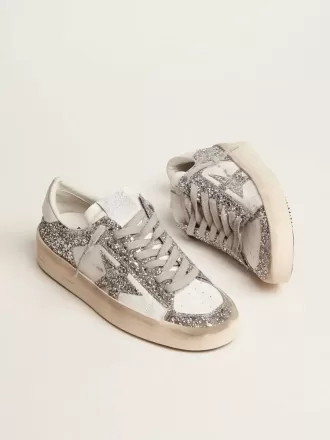 Stardan för damer i vitt läder och glitter
