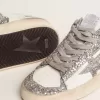 Stardan för damer i vitt läder och glitter