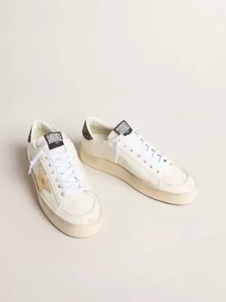 Stardan för damer med guldstjärna och glitter på hälfliken