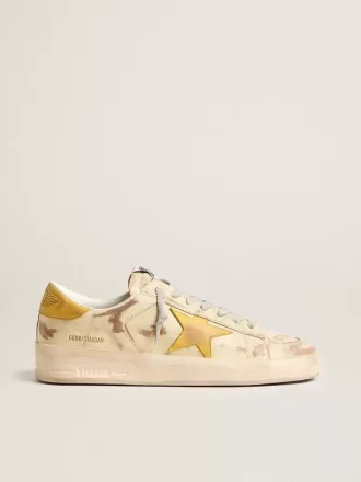 Stardan för herr i beige läder med honungsfärgad nubuckstjärna och hälflik