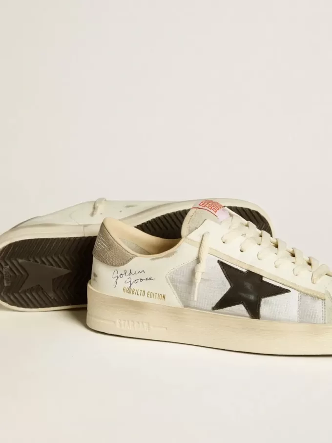 Stardan för herr i läder och nylon med svart läderstjärna och nubuckklackflik Stardan för herr i läder och nylon med svart läderstjärna och nubuckklackflik