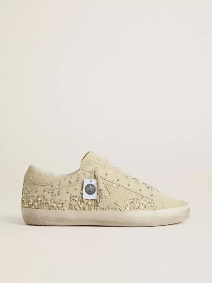 Super-Star för damer i beige mocka med pärlor och Swarovski-kristaller Super-Star för damer i beige mocka med pärlor och Swarovski-kristaller
