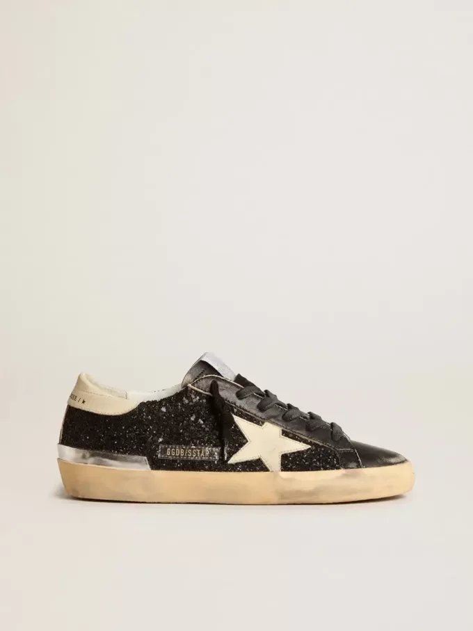 Super-Star för damer i svart glitter och nappa med krämfärgad läderstjärna och hälflik Super-Star för damer i svart glitter och nappa med krämfärgad läderstjärna och hälflik