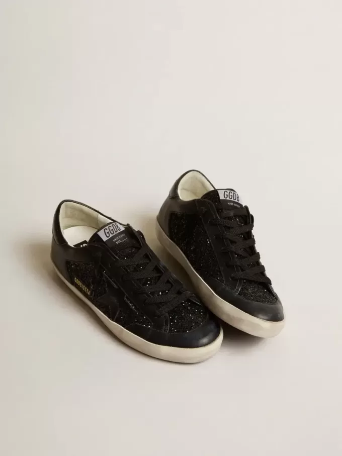 Super-Star för damer i svart nappa och glitter med glänsande svart läderstjärna Super-Star för damer i svart nappa och glitter med glänsande svart läderstjärna