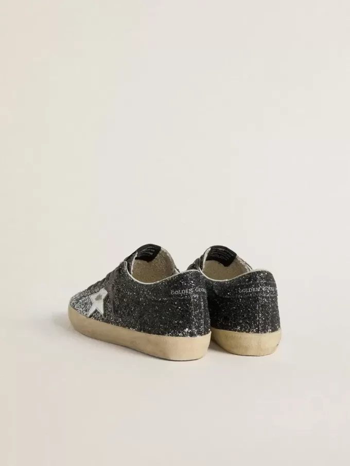 Super Star för damer med glitteröverdel och silvermetallisk läderstjärna