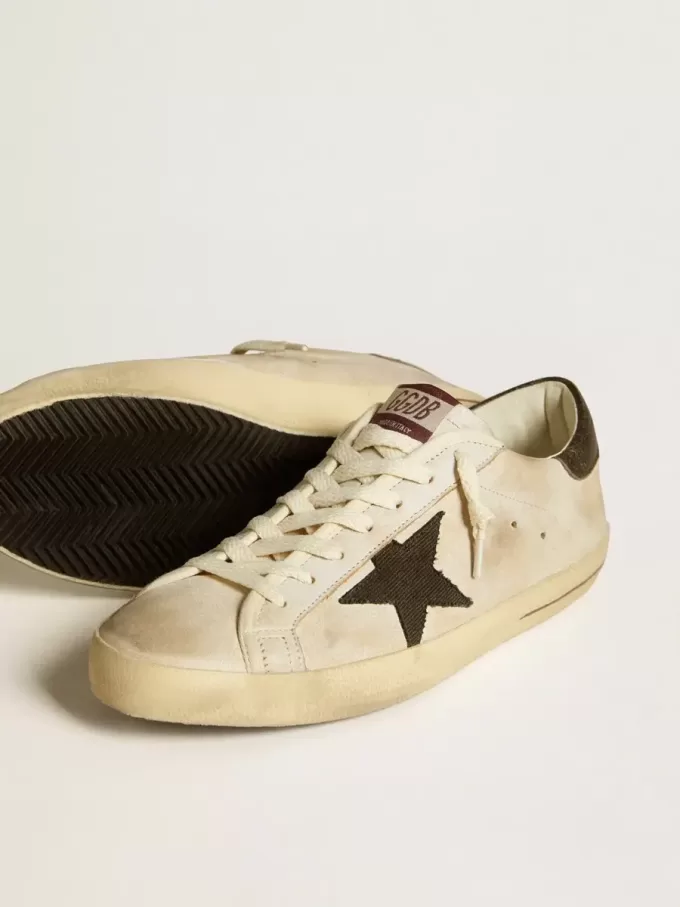 Super-Star för herr i läder med svart denimstjärna och svart läderflik på hälen Super-Star för herr i läder med svart denimstjärna och svart läderflik på hälen