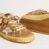 Super-Star i beige mocka och shearling med metallisk läderstjärna Super-Star i beige mocka och shearling med metallisk läderstjärna