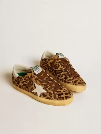 Super-Star LTD för damer i leopardmönstrat ponnyläder med läderstjärna och hälflik