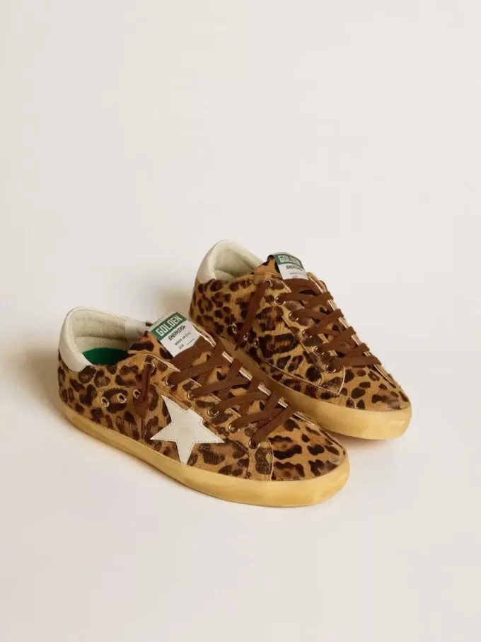 Super-Star LTD för damer i leopardmönstrat ponnyläder med läderstjärna och hälflik Super-Star LTD för damer i leopardmönstrat ponnyläder med läderstjärna och hälflik