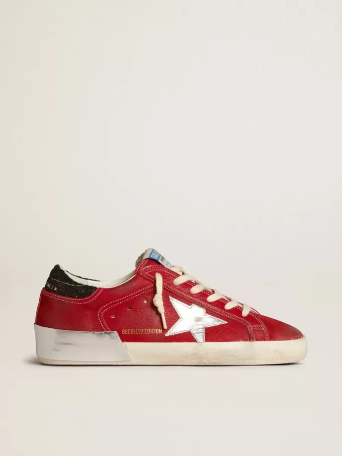 Super-Star LTD för damer i rött nubuck med läderstjärna och glitterklackflik Super-Star LTD för damer i rött nubuck med läderstjärna och glitterklackflik