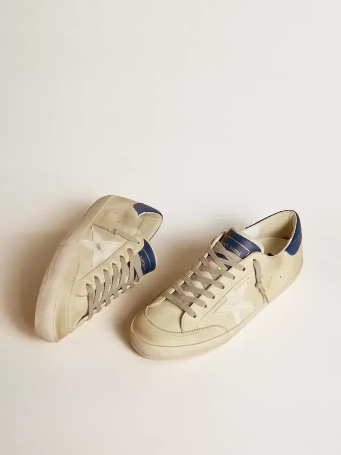 Super-Star LTD för herr i nubuck med vit läderstjärna och blå hälflik Super-Star LTD för herr i nubuck med vit läderstjärna och blå hälflik