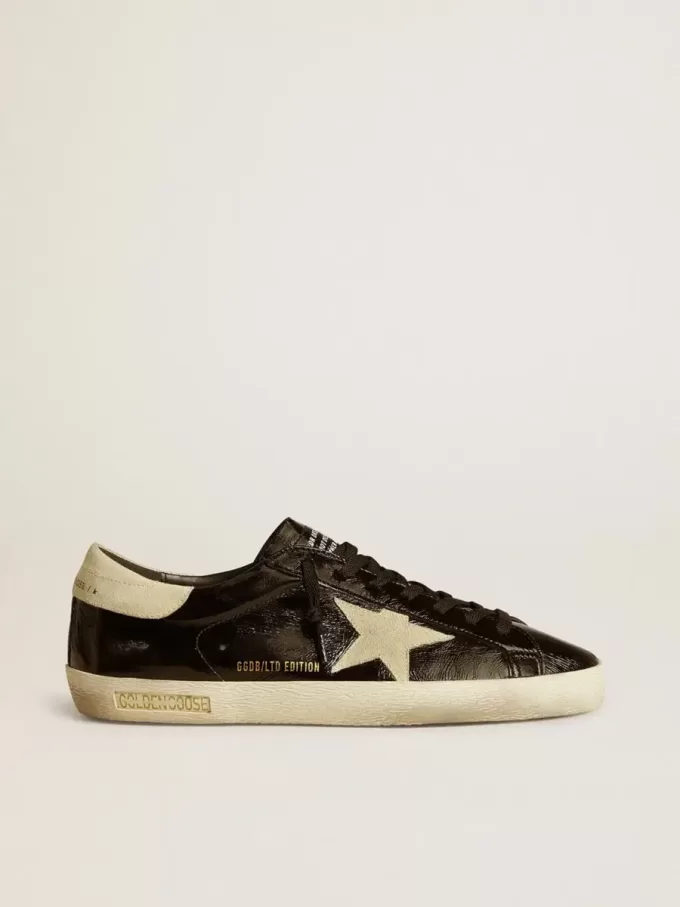 Super-Star LTD för herr i svart lackläder med stjärna och hälflik i mocka Super-Star LTD för herr i svart lackläder med stjärna och hälflik i mocka