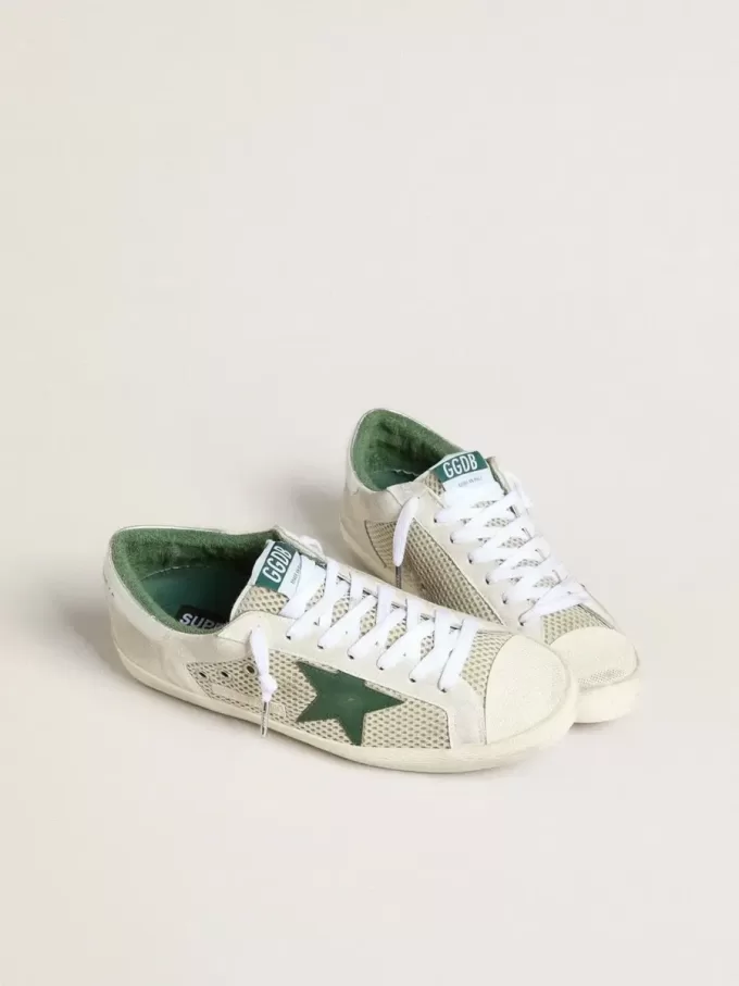 Super-Star LTD för herr i vitt mocka och mesh med grön läderstjärna och silverfärgad hälflik Super-Star LTD för herr i vitt mocka och mesh med grön läderstjärna och silverfärgad hälflik