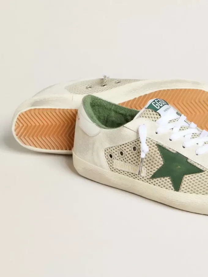 Super-Star LTD för herr i vitt mocka och mesh med grön läderstjärna och silverfärgad hälflik Super-Star LTD för herr i vitt mocka och mesh med grön läderstjärna och silverfärgad hälflik