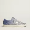 Super-Star LTD i flerfärgat glitter med silvermetallisk läderstjärna Super-Star LTD i flerfärgat glitter med silvermetallisk läderstjärna