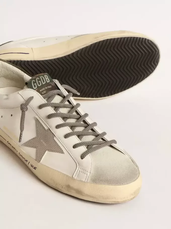 Super-Star LTD med krokodilprintad stjärna och grön hälflik Super-Star LTD med krokodilprintad stjärna och grön hälflik