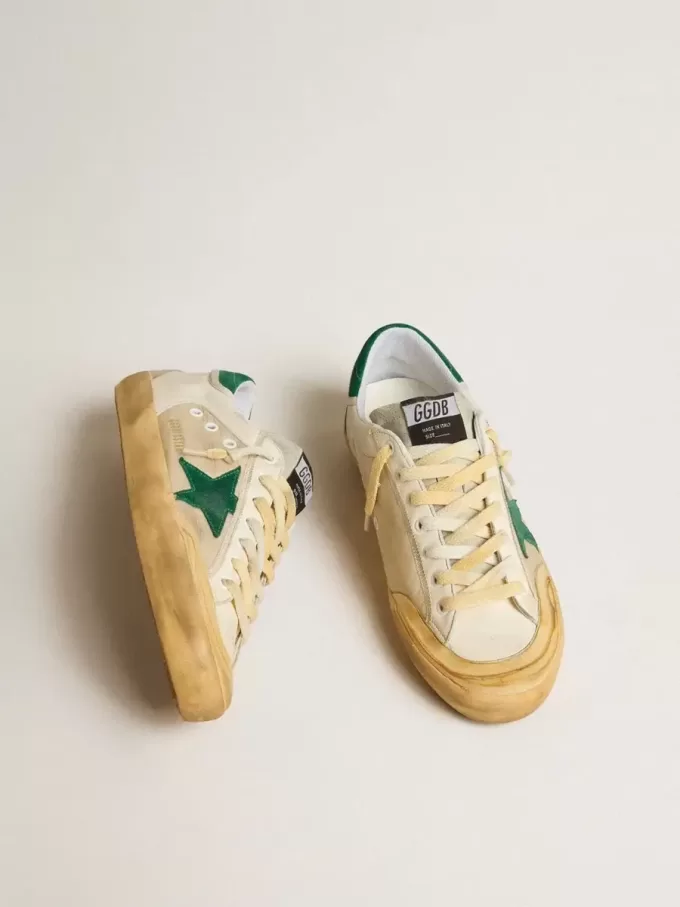 Super-Star Penstar för herr i nappa och nylon med grön mockastjärna och hälflik Super-Star Penstar för herr i nappa och nylon med grön mockastjärna och hälflik