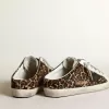 Super-Star Sabot för dam i leopardmönstrat ponnyskinn med svart stjärna Super-Star Sabot för dam i leopardmönstrat ponnyskinn med svart stjärna