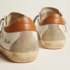 Super-Star-sneakers för damer med stjärna i mocka och brun hälflik Super-Star-sneakers för damer med stjärna i mocka och brun hälflik