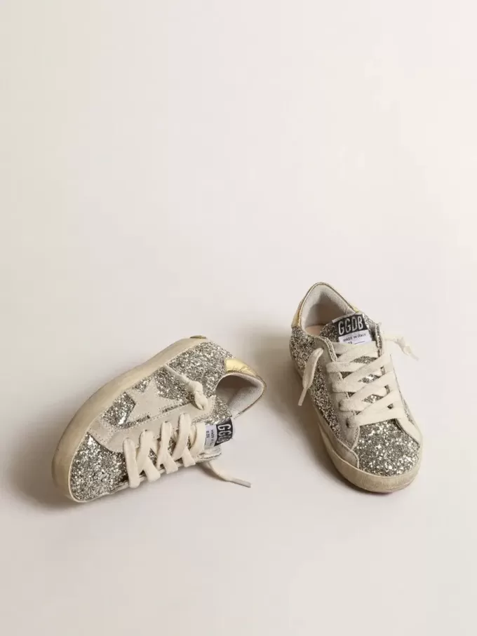 Super-Star Young i glitter med en stjärna i mocka och guldfärgad hälflik Super-Star Young i glitter med en stjärna i mocka och guldfärgad hälflik