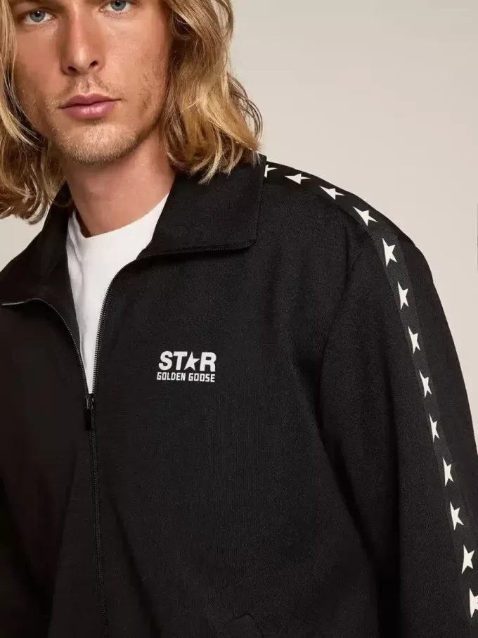Svart sweatshirt med dragkedja och vita stjärnor för herr Svart sweatshirt med dragkedja och vita stjärnor för herr