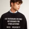 Svart sweatshirt med rund hals och broderad text Svart sweatshirt med rund hals och broderad text