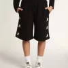 Svarta bermudashorts för pojkar med vita stjärnor Svarta bermudashorts för pojkar med vita stjärnor