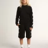 Svarta bermudashorts för pojkar med vita stjärnor Svarta bermudashorts för pojkar med vita stjärnor