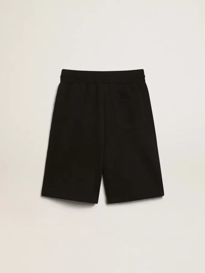 Svarta bermudashorts för pojkar med vita stjärnor Svarta bermudashorts för pojkar med vita stjärnor