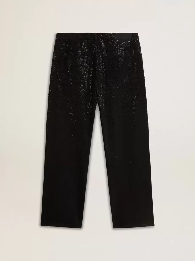 Svarta jeans för herr med lös passform och kristaller med gradienteffekt över hela plagget Svarta jeans för herr med lös passform och kristaller med gradienteffekt över hela plagget