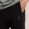 Svarta joggingbyxor för herr med stjärna på framsidan Svarta joggingbyxor för herr med stjärna på framsidan