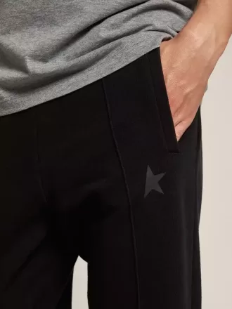 Svarta joggingbyxor för herr med stjärna på framsidan