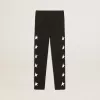 Svarta leggings för flickor med vita stjärnor på sidorna Svarta leggings för flickor med vita stjärnor på sidorna