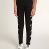 Svarta leggings för flickor med vita stjärnor på sidorna Svarta leggings för flickor med vita stjärnor på sidorna