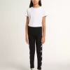 Svarta leggings för flickor med vita stjärnor på sidorna Svarta leggings för flickor med vita stjärnor på sidorna