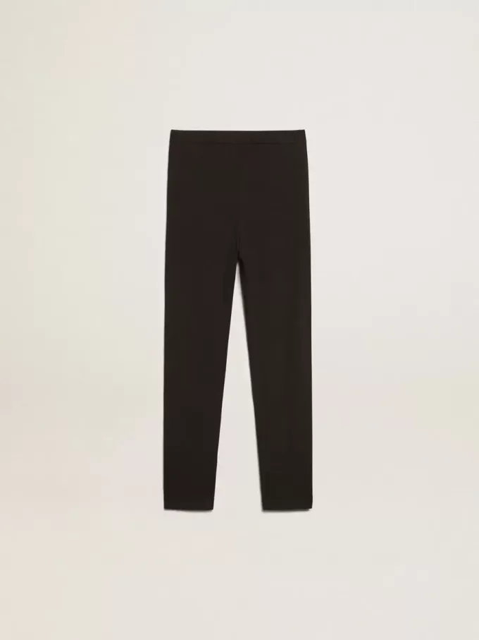 Svarta leggings för flickor med vita stjärnor på sidorna Svarta leggings för flickor med vita stjärnor på sidorna