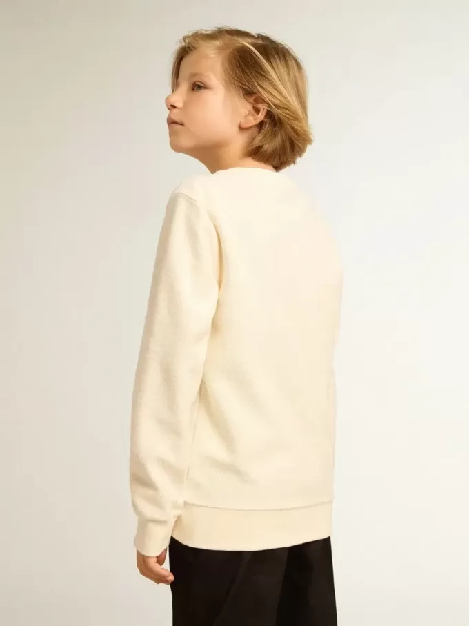 Sweatshirt i åldrat vitt med flerfärgad Golden-text på framsidan Sweatshirt i åldrat vitt med flerfärgad Golden-text på framsidan
