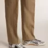 True-Star för herr i silverpaljetter med svart stjärna och beige läderflik på hälen True-Star för herr i silverpaljetter med svart stjärna och beige läderflik på hälen