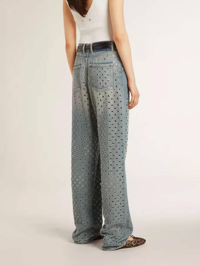 Tvättade jeans för dam med öglor över hela plagget